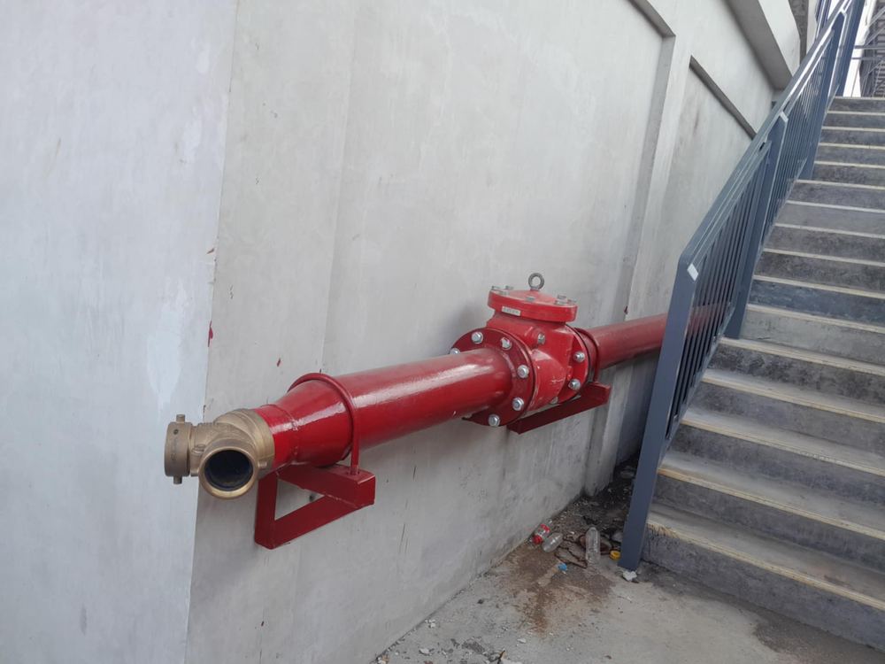 Riser pipe installation, stairwell